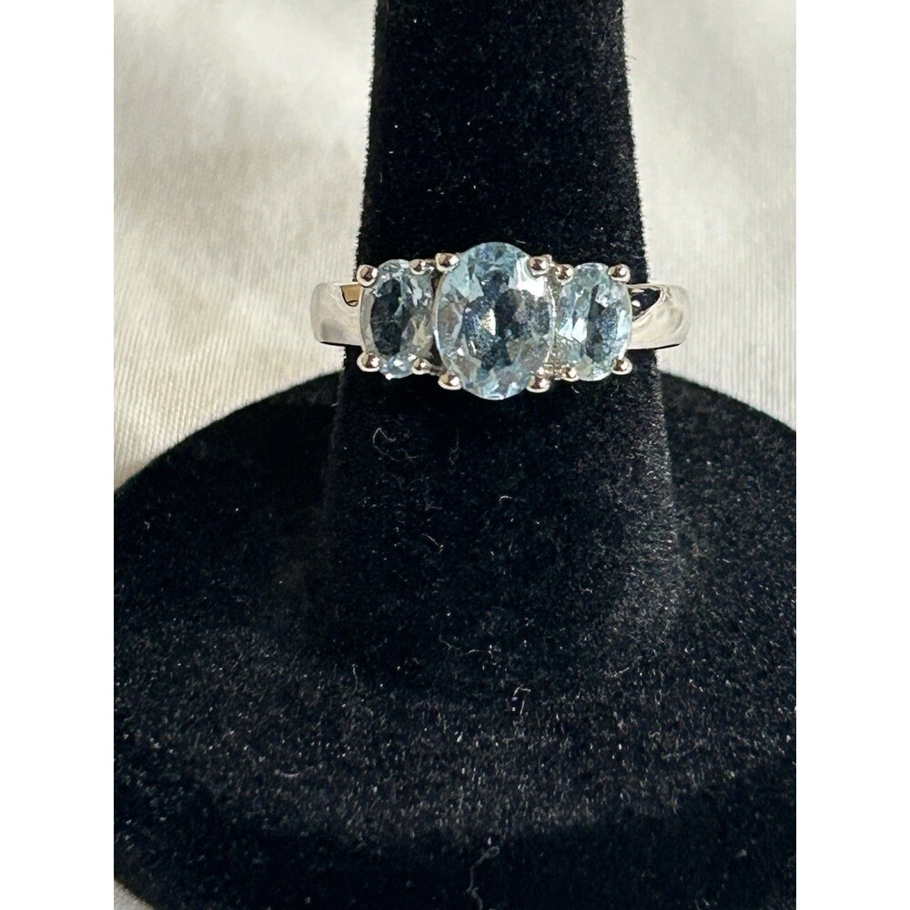 Silver Tone Beautiful Three Oval Cut Baby Blue CZ's Band Ring Size 6 J369